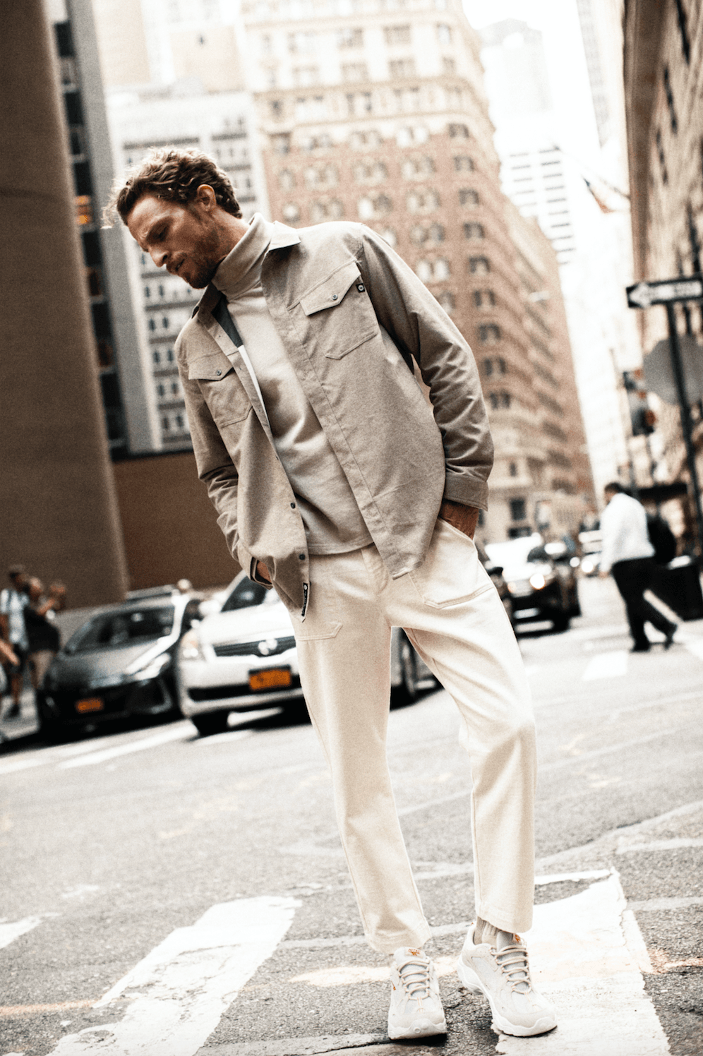 Image may contain Clothing Shoe Footwear Apparel Human Person Pedestrian Car Transportation Vehicle and Automobile