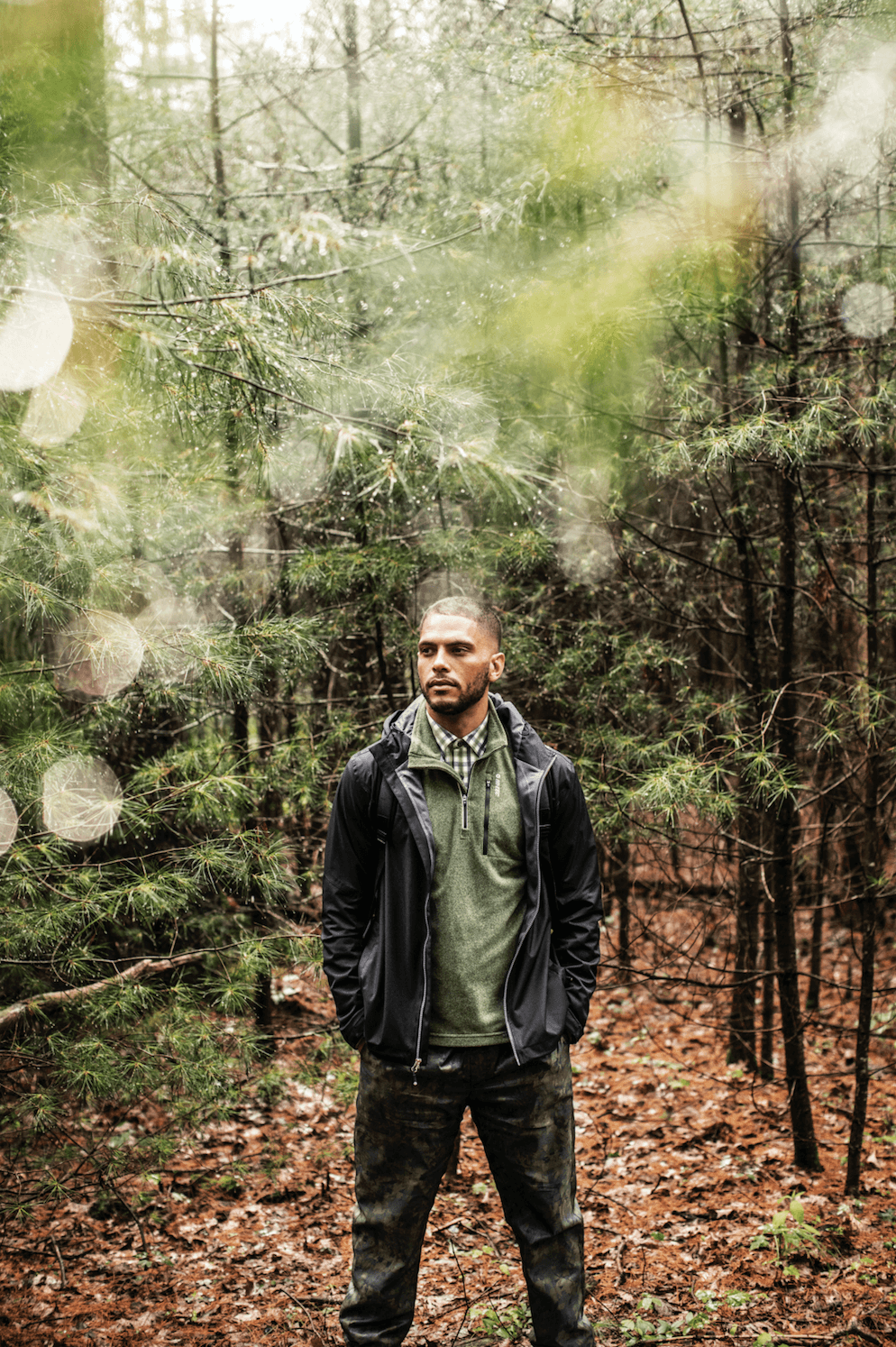 Image may contain Coat Clothing Apparel Jacket Human Person Leather Jacket Tree Plant and Vegetation